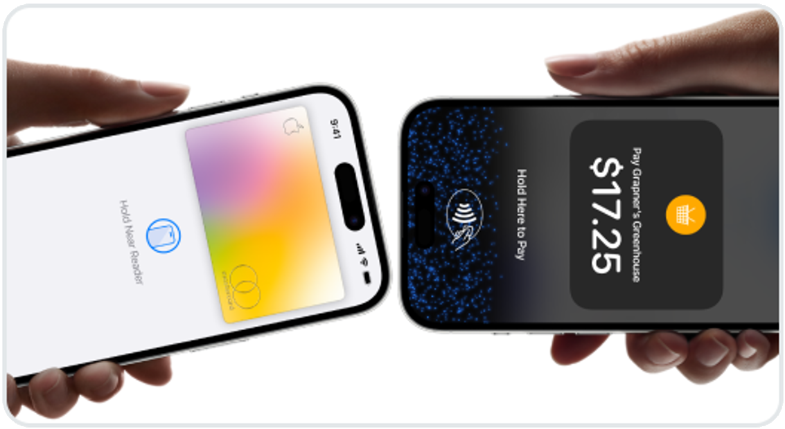 Mobile device held next to another mobile device for contactless payment.
